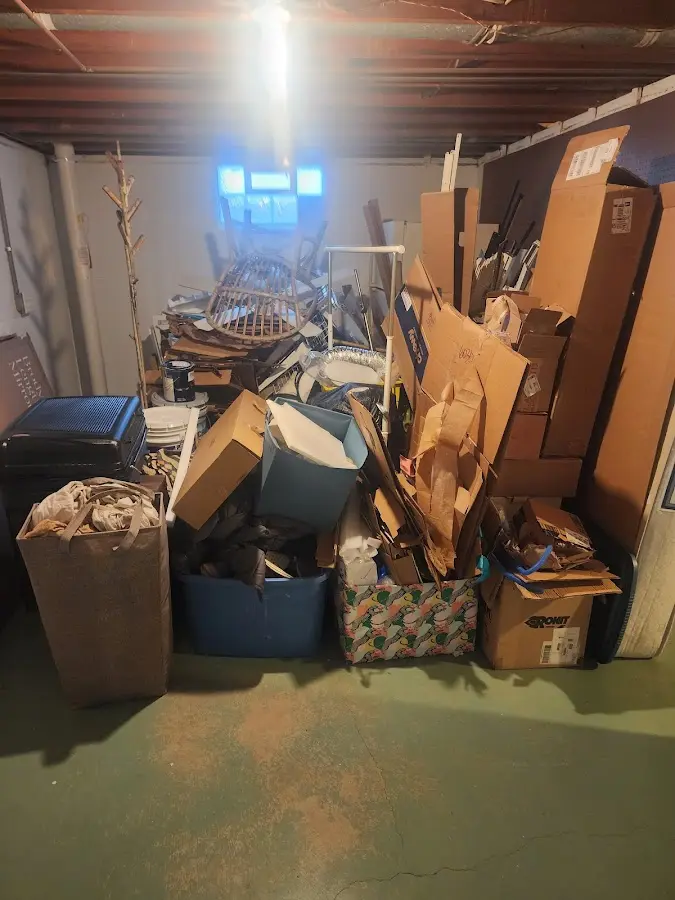 Roll-off dumpster container at job site for Roll Off Dumpster Rental in Handy